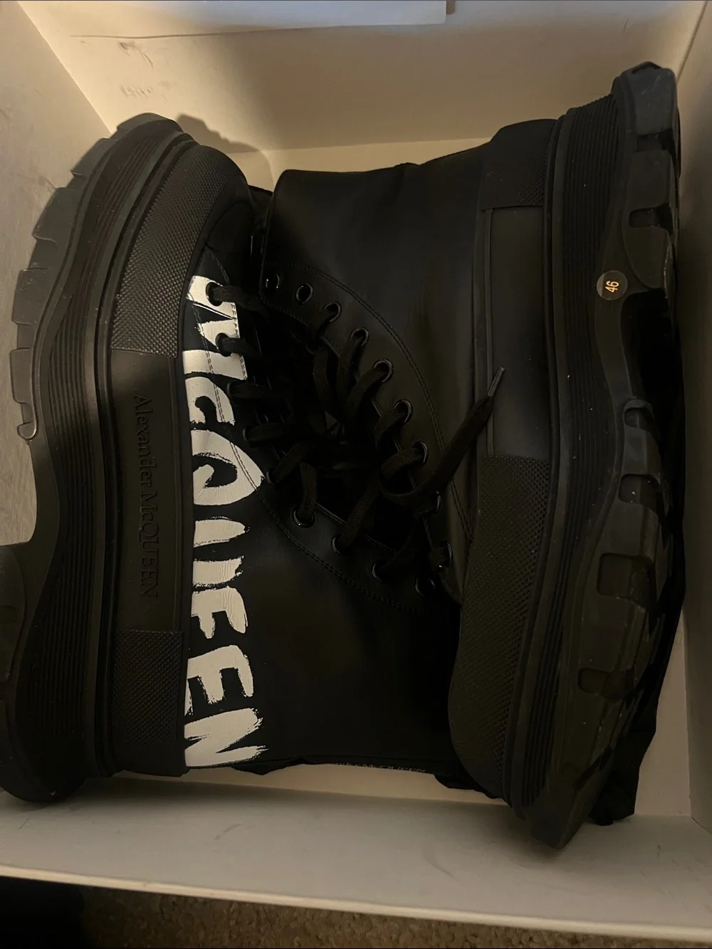 Alexander McQueen Black High-Top Sneakers with White Logo Paint